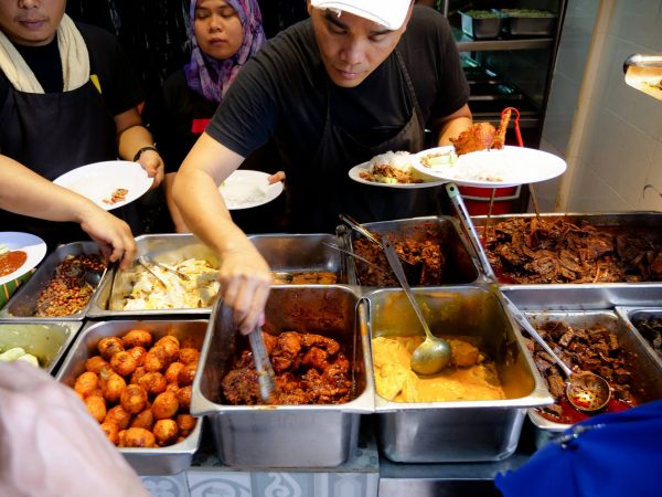 The name of the food you need to try here is Nasi Lemak, and it is one of the most well loved dishes in the entire Malay Peninsula