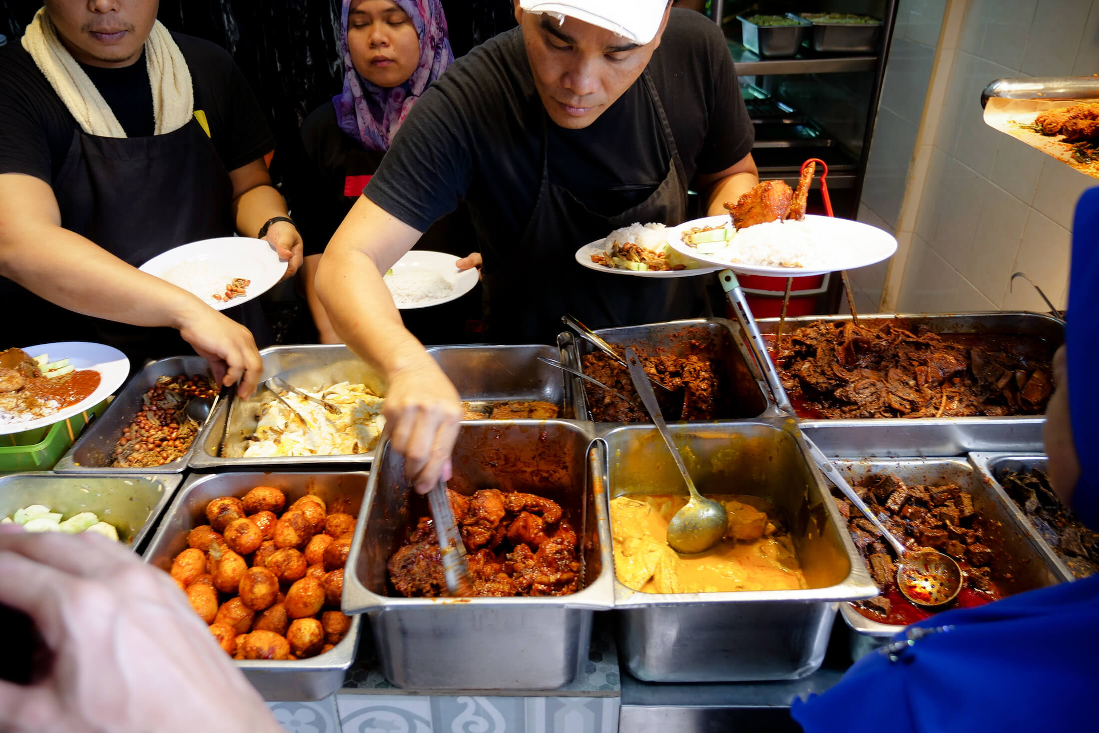 The name of the food you need to try here is Nasi Lemak, and it is one of the most well loved dishes in the entire Malay Peninsula